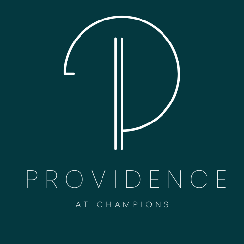 A logo with the text "Providence at Champions" in front of it.